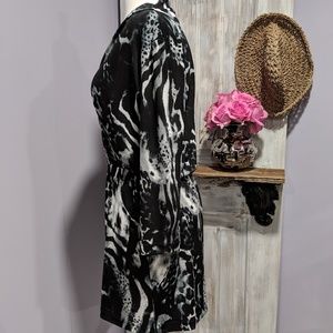 Chico's Dresses - Chico's animal print, wrap top, 3/4 sleeve dress Chico's Dresses - Chico's animal print, wrap top, 3/4 sleeve dress